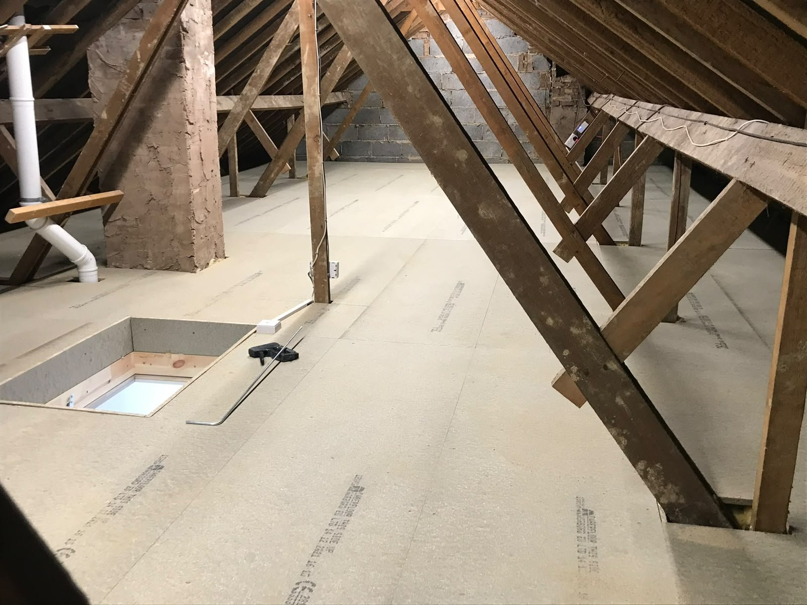 Wide boarded loft storage project by Quick Fit Lofts